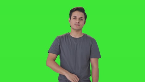 Disappointed-Indian-man-showing-thumbs-down-Green-screen