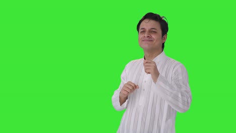 Happy-Indian-man-dancing-and-enjoying-Green-screen