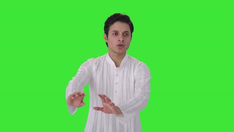 Indian-man-scared-of-something-Green-screen