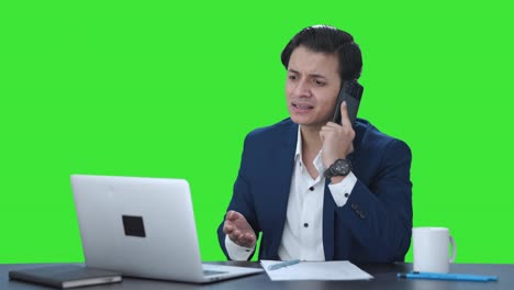 Angry-Indian-manager-shouting-on-phone-Green-screen