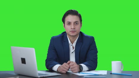 Indian-businessman-looking-at-the-camera-Green-screen