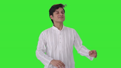 Frustrated-Indian-man-flying-a-bee-Green-screen
