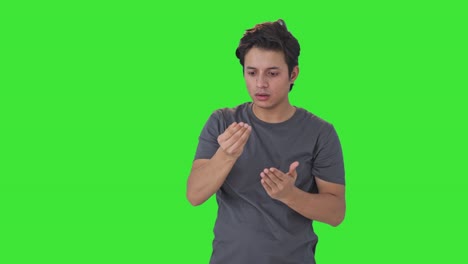 Indian-man-suffering-from-hair-loss-Green-screen