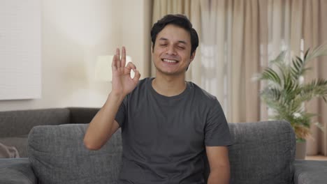 Happy-Indian-man-showing-okay-sign