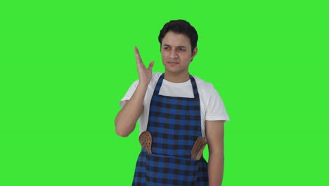 Indian-cook-disgusted-by-bad-smell-Green-screen