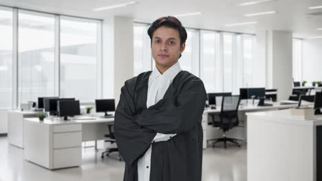 Portrait-of-confident-Indian-lawyer-standing-crossed-hands
