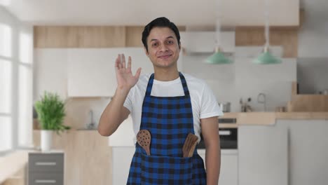 Happy-Indian-cook-saying-hello