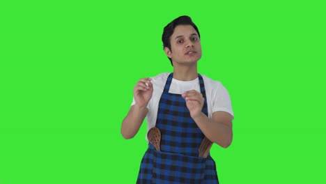 Indian-cook-talking-to-someone-Green-screen