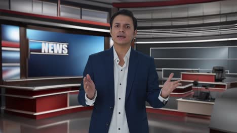 Indian-journalist-reading-news-to-audience