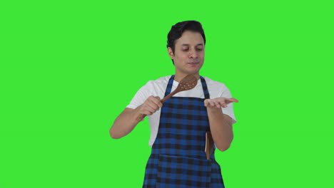 Indian-cook-tasting-spicy-food-Green-screen