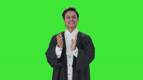 Happy-Indian-lawyer-clapping-and-appreciating-Green-screen