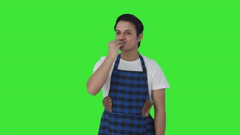 Happy-Indian-cook-giving-chef-kiss-Green-screen