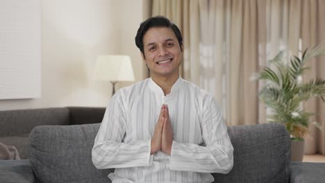 Happy-Indian-man-doing-Namaste