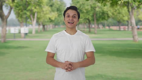 Happy-Indian-man-smiling-to-the-camera