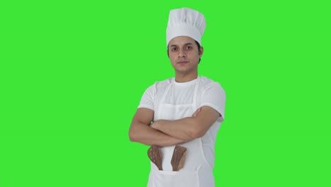 Portrait-of-Confident-professional-chef-standing-crossed-hands-Green-screen