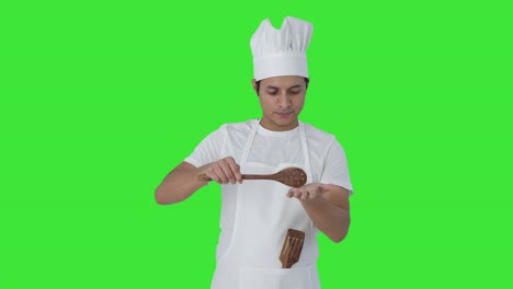 Indian-professional-chef-tasting-bad-food-Green-screen