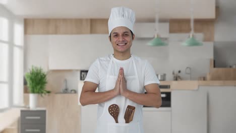 Happy-Indian-professional-chef-doing-Namaste