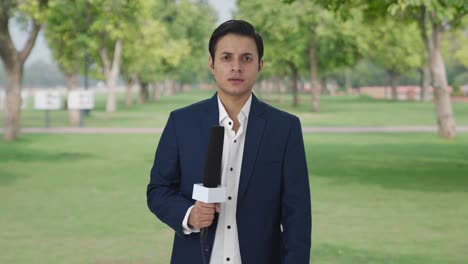 Angry-Indian-reporter-looking-to-the-camera