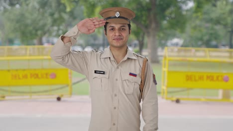 Happy-Indian-police-officer-saluting