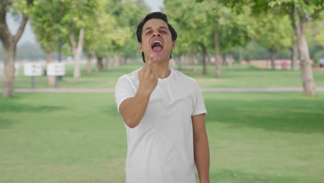 Angry-Indian-man-showing-middle-finger