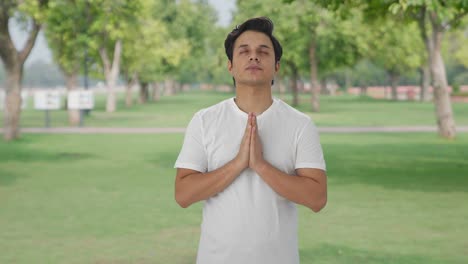 Religious-Indian-man-praying-to-God