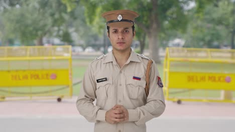 Angry-Indian-police-officer-looking-to-the-camera