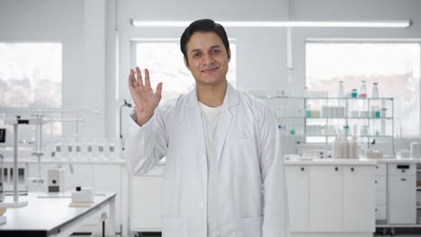 Happy-Indian-scientist-saying-hello