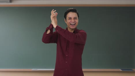 Happy-Indian-teacher-clapping-and-appreciating