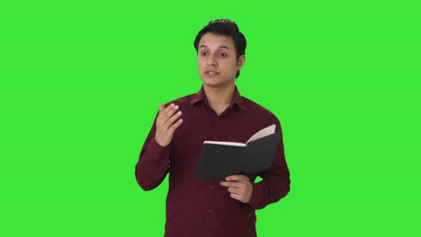 Indian-teacher-teaching-in-class-Green-screen