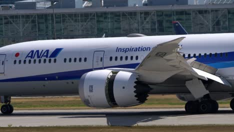 A-ANA-Boeing-787-Turbofan-Jet-Engine-with-Open-Reverse-After-Landing