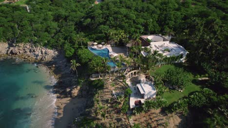Aerial-view-of-drone-flying-over-luxury-resort,-travel-vacation-lifestyle