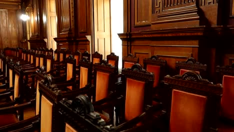 Row-of-chairs-in-Hall-of-General-Assemblies-in-Palacio-da-Bolsa,-Porto