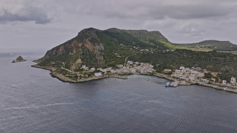 Levanzo-Italy-Aerial-v1-cinematic-drone-flyover-the-sea-capturing-serene-coastal-landscape-of-one-of-the-Aegadian-Islands-in-the-Mediterranean-Sea---Shot-with-Mavic-3-Cine---May-2023