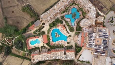 Top-view-of-a-hotel-complex-and-its-surroundings-in-the-Maltese-island-of-Gozo