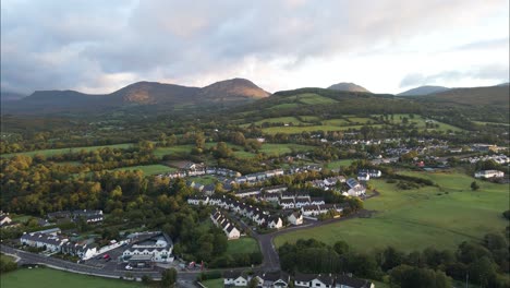 Village-town-of-Kenmare,-Ireland-by-Ring-of-Kerry---Aerial-at-Sunset
