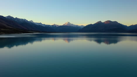 Stunning-aerial-drone-view-of-Mount-Cook-from-Lake-Pukaki,-New-Zealand