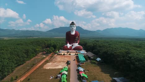 Aerial-Massive-Buddha-Statue-Asia-Countryside-Pull-Back-Drone