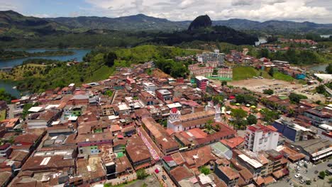 Guatape-colorful-village-and-peñol-rock-in-background