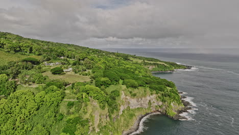 Maui-Hawaii-Aerial-v5-drone-flyover-island-coastline-capturing-tranquil-coastal-landscape-of-Kauakio-bay,-ranch,-lush-vegetations-and-pacific-ocean-views---Shot-with-Mavic-3-Cine---December-2022