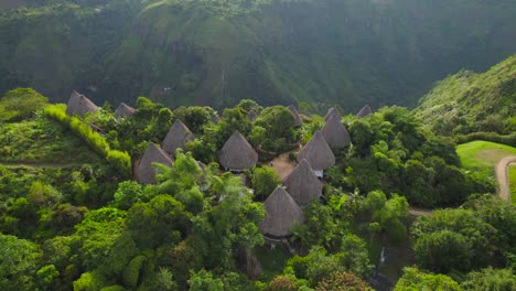 Wooden-hut-eco-hotel-on-the-edge-of-a-canyon-jungle-in-Colombia-at-sunset