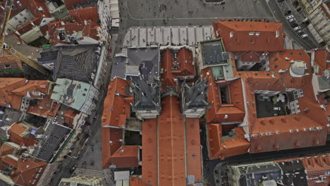 Prague-Czechia-Aerial-v111-vertical-top-down-view,-flyover-famous-old-town-square-capturing-gothic-architectures-catholic-church-and-astronomical-clock-tower---Shot-with-Mavic-3-Cine---November-2022