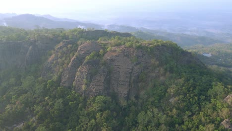 Aerial-view-of-Pre-historic-volcano-of-Nglanggeran-in-Wonosari-Yogyakarta,-Indonesia