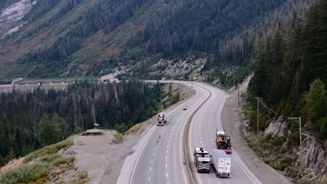 Semi-Truck-Carrying-Excavator-down-Coquihalla-Highways-Steep-Slopes