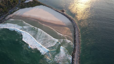 Aerial-View-Of-Turners-Beach-During-Sunset---Clarence-River-And-Yamba-Breakwater-In-NSW,-Australia
