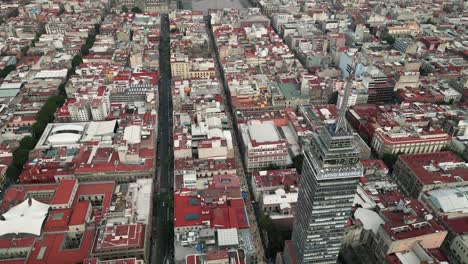 Drone's-eye-perspective,-latinoamericana-tower's-domain-among-historic-center