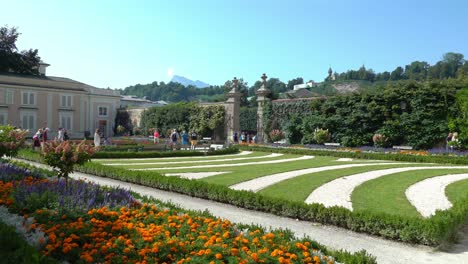 Huge-Group-of-Tourists-Walking-Inside-Mirabell-Palace-Gardens