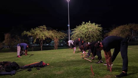 Warming-up-lower-back-before-practice-of-Haidong-Gumdo-at-the-park
