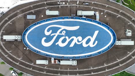 Ford-logo-on-roof-of-Ford-Experience-Center-FXC-in-Dearborn,-Michigan