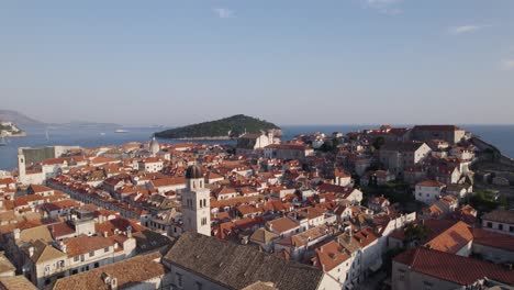Aerial-over-stone-wall-fortification-and-Stradun-esplanade-in-Dubrovnik-Old-Town