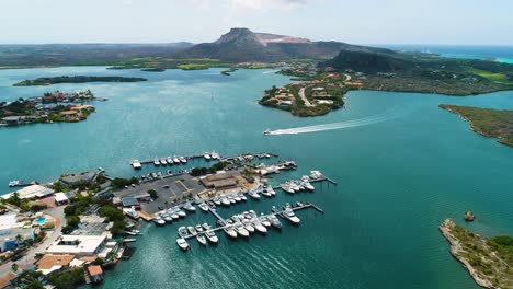 Curacao-Yacht-Club-harbor-in-Spanish-waters-Curacao,-high-angle-aerial-overview